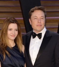 FILE - In this March 2, 2014 file photo, Talulah Riley, left, and Elon Musk attend the 2014 Vanity Fair Oscar Party, in West Hollywood, Calif. Riley has filed to end her second marriage to billionaire entrepreneur Elon Musk. Rileys filing Monday, March 21, 2016, in Los Angeles Superior Court is the second attempt to end the pairs second marriage. Musk filed for divorce on New Years Eve in 2014 but withdrew the petition seven months later. (Photo by Evan Agostini/Invision/AP, File)