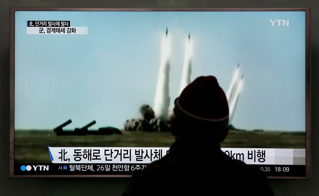 A man watches a TV screen showing a file footage of the missile launch conducted by North Korea, at Seoul Railway Station in Seoul, South Korea, Monday, March 21, 2016. North Korea fired short-range projectiles into the sea on Monday, Seoul officials said, in a continuation of weapon launches it has carried out in an apparent response to ongoing South Korea-U.S. military drills it sees as a provocation. (AP Photo/Lee Jin-man)