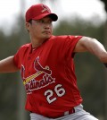 St. Louis Cardinals pitcher Seung Hwan Oh, of South Korea, throws a bullpen session during spring training baseball practice Sunday, Feb. 21, 2016, in Jupiter, Fla. (AP Photo/Jeff Roberson)