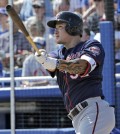 Minnesota Twins' Park Byung-ho, of South Korea, follows the flight of his home run off Toronto Blue Jays starting pitcher Gavin Floyd during the second inning of a spring training baseball game Tuesday, March 8, 2016, in Dunedin, Fla. (AP Photo/Chris O'Meara)