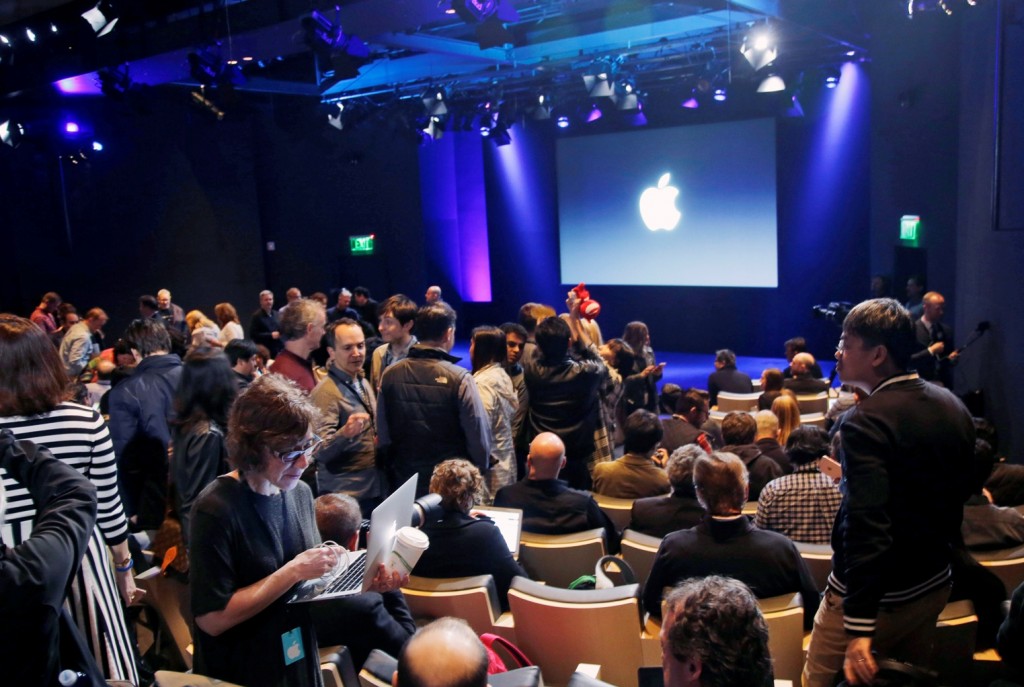 Media and invited guests wait for the start of an event to announce new products at Apple headquarters, Monday, March 21, 2016, in Cupertino, Calif. (AP Photo/Marcio Jose Sanchez)