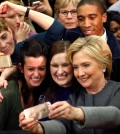 Democratic presidential candidate Hillary Clinton takes photos with supporters after speaking at a campaign rally in Norfolk, Va., Monday, Feb. 29, 2016. (AP Photo/Gerald Herbert)