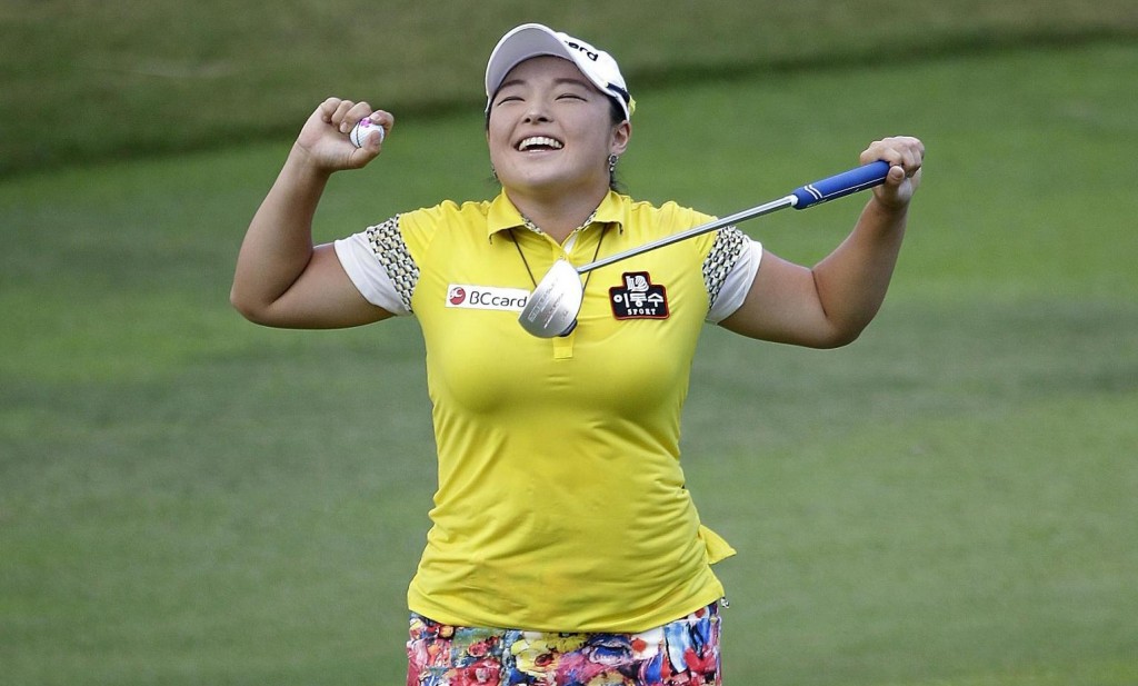 ang Ha Na of South Korea celebrates after winning the HSBC Women's Champions Golf tournament on Sunday, March 6, 2016, in Singapore. (AP Photo/Wong Maye-E)