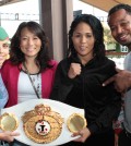 Kim Messer-Caminschi, second from left, has worked closely with Shane Mosley.