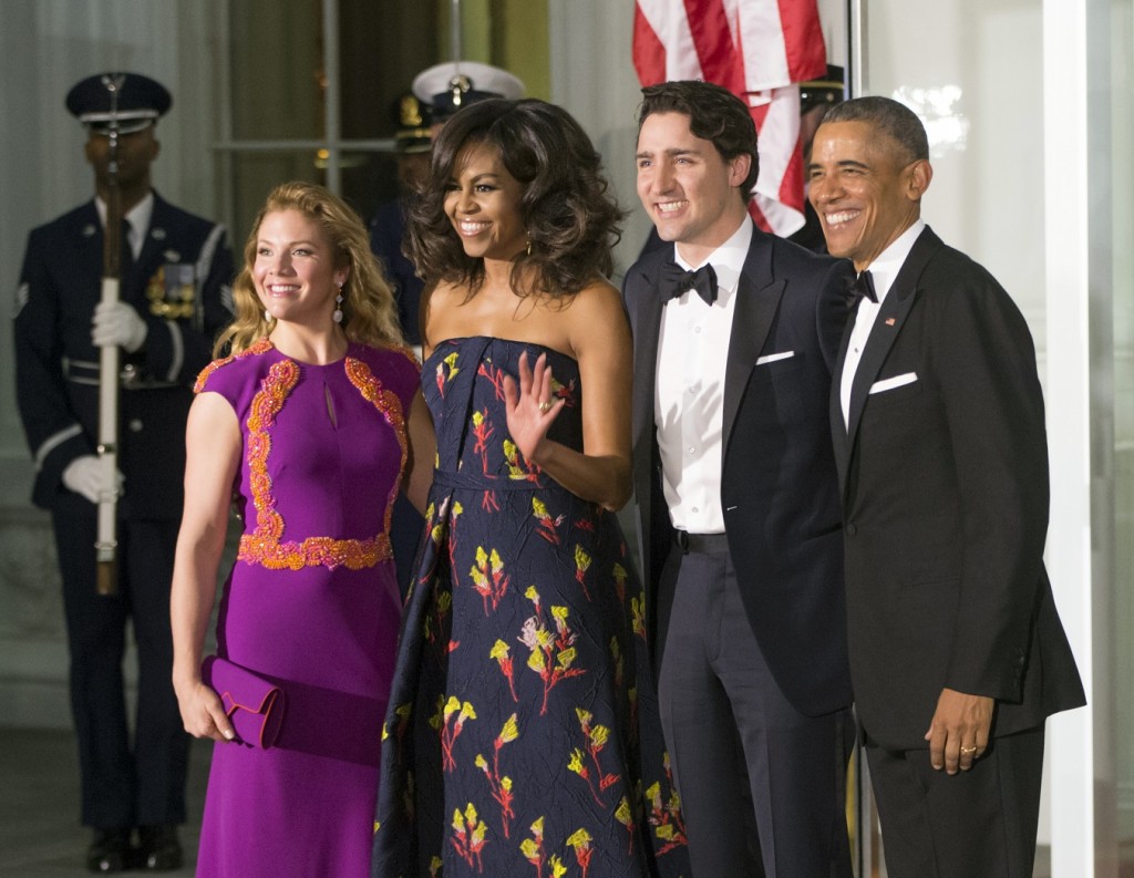 President Barack Obama and first lady Michelle Obama greet Canadian Prime Minister Justin Trudeau and Sophie Grégoire Trudeau at the North Portico of the White House in Washington, Thursday, March 10, 2016, for a state dinner.   (AP Photo/J. Scott Applewhite)