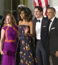 President Barack Obama and first lady Michelle Obama greet Canadian Prime Minister Justin Trudeau and Sophie Grégoire Trudeau at the North Portico of the White House in Washington, Thursday, March 10, 2016, for a state dinner.   (AP Photo/J. Scott Applewhite)