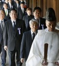 A group of Japanese lawmakers visit the Yasukuni war shrine in Tokyo on April 22, 2016, in this photo released by Kyodo News.