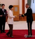 President Park Geun-hye confers the Order of National Security Merit, the highest military award, to Gen. Curtis Scaparrotti, the outgoing commander of U.S. troops in South Korea, in a ceremony at Cheong Wa Dae, South Korea’s presidential office, on April 29, 2016.