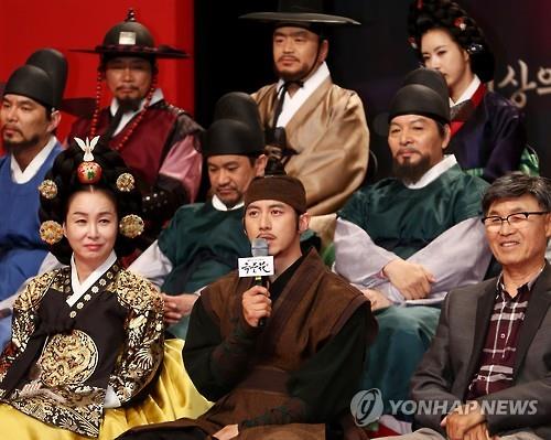 Actress Kim Mi-sook (front row, L), actor Go Soo (front row, C) and director Lee Byung-hoon (front row, R) attend the press conference for MBC's epic series "Flower In Prison" in MBC's Media Center in Sangam-dong, northwestern Seoul, on April 27, 2016.