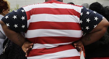 FILE - In this May 8, 2014 file photo, an overweight is seen in New York. International diabetes organizations are calling for weight-loss surgery to become a more routine treatment option for diabetes, even for some patients who are only mildly obese. Obesity and Type 2 diabetes are a deadly pair, and numerous studies show stomach-shrinking operations can dramatically improve diabetes. (AP Photo/Mark Lennihan, File)