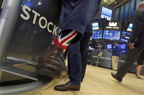 Specialist Michael Pistillo wears Union Jack socks as he works on the floor of the New York Stock Exchange, Friday, June 24, 2016. U.S. stocks are plunging in early trading after Britons voted to leave the European Union.