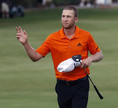 Daniel Berger waves to the crowd after winning the FedEx St. Jude Classic golf tournament, Sunday, June 12, 2016, in Memphis, Tenn. Berger won the tournament on Sunday for his first PGA Tour title, shooting a 3-under 67 to hold off Phil Mickelson, Steve Stricker and Brooks Koepka by three strokes
