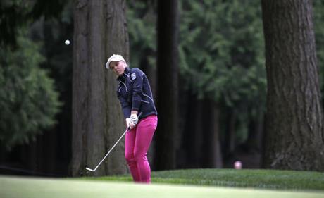 Brooke Henderson, of Canada, chips the ball during the first round of the Women's PGA Championship golf tournament at Sahalee Country Club Thursday, June 9, 2016, in Sammamish, Wash.