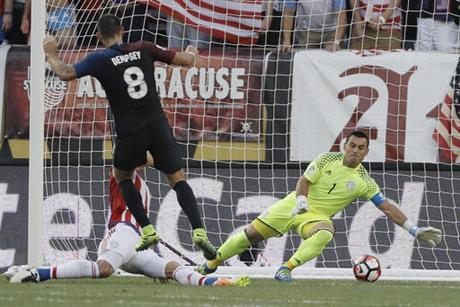 United States' Clint Dempsey, center, scores a goal past Paraguay's Justo Villar, right, and Fabian Balbuena during the first half of a Copa America Group A soccer match Saturday, June 11, 2016, in Philadelphia.