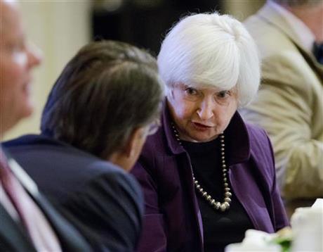 In this Monday, June 6, 2016, file photo, Federal Reserve Chair Janet Yellen sits for lunch before making a scheduled speech in Philadelphia. Ending its latest policy meeting on Wednesday, June 15, the Federal Reserve issues a statement, updates its forecasts and holds a news conference with Yellen.