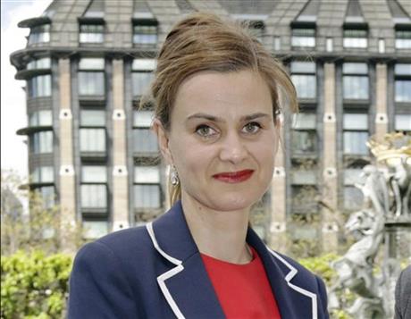 RECROP OF LON812 FILE In this May 12, 2015 file photo, Labour Member of Parliament Jo Cox poses for a photograph. British lawmaker Cox has been injured in a shooting incident near Leeds, in West Yorkshire, England, it has been reported, Thursday June 16, 2016.