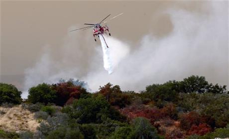 Helicopter drop of the Sherpa Fire in Santa Barbara County, Calif., Friday, June 17, 2016. 