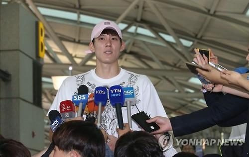 South Korean swimmer Park Tae-hwan speaks to reporters at Incheon International Airport before departing for his Australian training camp on June 3, 2016.