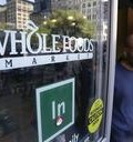 Earns Whole Foods