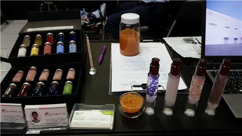 This photo taken on July 7, 2016, shows cosmetics ingredients displayed in a booth set up by a Chinese company during the "in-cosmetics Korea exhibition" held at COEX hall in southern Seoul from July 6-7. (Yonhap)