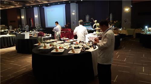 International judges evaluate dishes submitted to the 2016 Asian Master Chefs Competition in Korea in central Seoul on June 18, 2016.