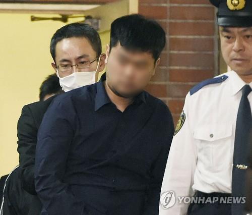 This file photo shows a South Korean man, identified only by his surname Chon, who has been indicted over the suspected bombing last year of a public restroom at a Tokyo war shrine.