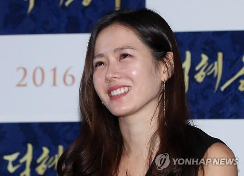 South Korea Son Ye-jin smiles during a press conference in Seoul on July 27, 2016. 