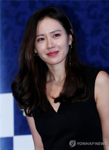 South Korean actress Son Ye-jin greets reporters at a press briefing for her latest film "The Last Princess" on July 27, 2016.