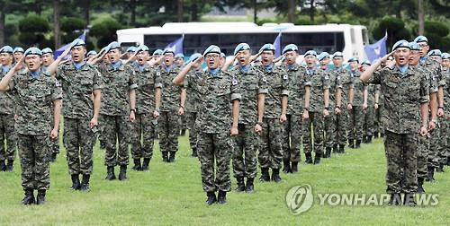 In this photo taken on July 26, 2016, a new team of soldiers who will replace their colleagues in the Dongmyung Unit in Lebanon salute in an event held in Incheon, 40 km west of Seoul. 
