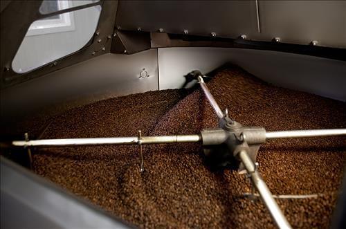 In this photo, provided by Dongsuh Food Co., coffee is being roasted. 