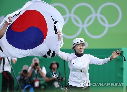 South Korean archer Chang Hye-jin celebrates her gold medal in the women's individual event at the Rio de Janeiro Olympics on Aug. 11, 2016.