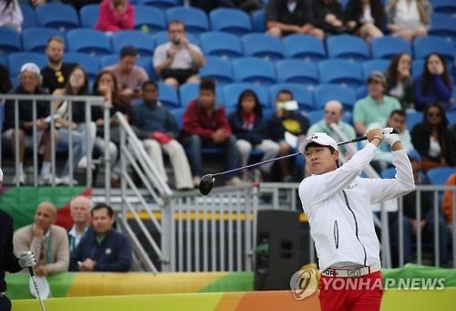 Wang Jeung-hun of South Korea tees off during the first round of men's golf at the Rio de Janeiro Olympics on Aug. 11, 2016.
