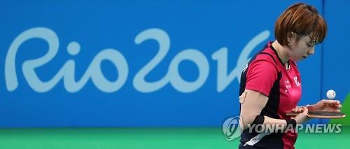 South Korean table tennis player Suh Hyo-won takes a break during the women's team quarterfinals against Singapore at the Rio de Janeiro Olympics on Aug. 13, 2016.