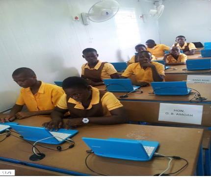 This undated photo, provided by the Education Ministry on Aug. 17, 2016, shows students studying in a solar school.