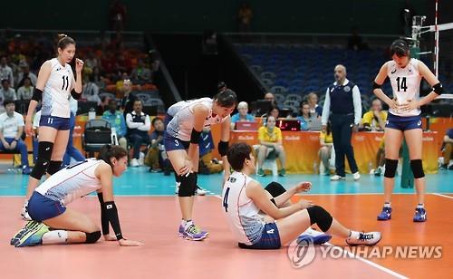South Korean women's volleyball players stay on the court after allowing a point to the Netherlands in their Rio de Janeiro Olympic quarterfinals on Aug. 16, 2016. 