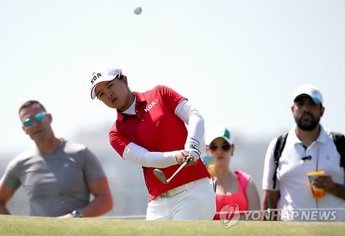 South Korea's Kim Sei-young hits a shot on to the first green at Olympic Golf Course in the first round of the Rio de Janeiro Olympic women's golf tournament on Aug. 17, 2016. 