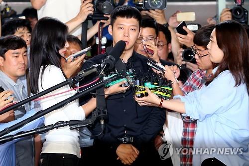 Park Yu-chun, the troubled member of popular K-pop boy band JYJ, appears at the Gangnam Police Station in southern Seoul on June 30, 2016, to face questioning over his sexual assault allegations. After a monthlong investigation, local police said Park is suspected of having sex with a woman and promising some sort of compensation, which was not kept.