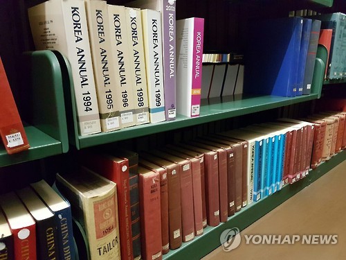 This photo, taken on Sept. 1, 2016, shows earlier editions of Yonhap News Agency's English-language almanac on a shelf at the library of the United Nations Office at Geneva.