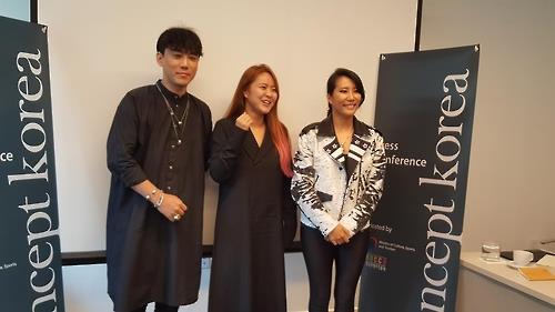 The undated photo shows Korean designers, Kim Tae-geun (L), Kim Hee-jin (C), and Park Yoon-hee (R) who join the Concept Korea S/S 2017. 