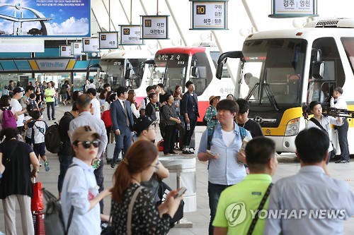 A bus terminal in southern Seoul is crowded with homebound travelers on Sept. 13, 2016, as South Korea's annual exodus for the Chuseok fall harvest holiday begins. South Koreans reunite with family members on Chuseok, which falls on Sept. 15 this year, and offer a ritual feast to their ancestors.