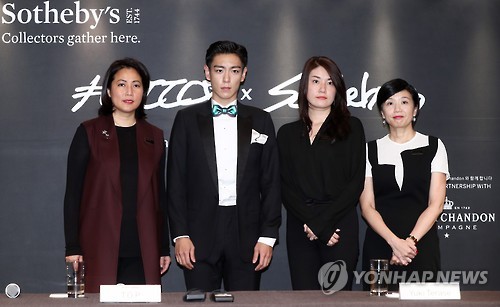 From left: Patti Wong, chairperson of Sotheby's Asia; T.O.P, a member of South Korean boy band BigBang; Yuki Terase, a specialist in Sotheby's Contemporary Asian Art department; and Evelyn Lin, head of Sotheby's Contemporary Asian Art department.