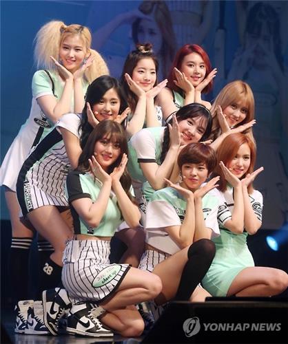 Members of the South Korean girl group TWICE perform in a media showcase event for their new song "Cheer Up" in southeastern Seoul on April 25, 2016.