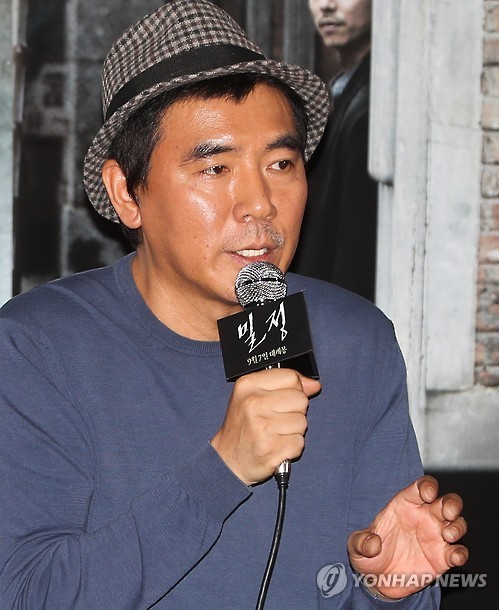 South Korean director Kim Jee-woon speaks during a press preview of his new film "The Age of Shadows" at a Seoul theater on Aug. 25, 2016
