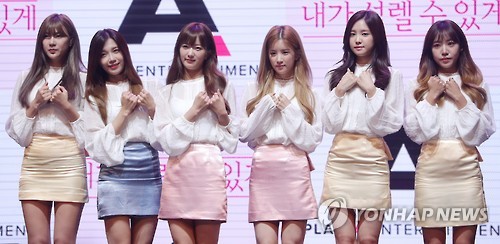 Members of South Korean girl group Apink pose at the media showcase event held in Southwestern Seoul on Sept. 26, 2016. 