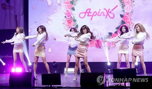 Members of South Korean girl group Apink perform at the media showcase event held in Southwestern Seoul on Sept. 26, 2016.