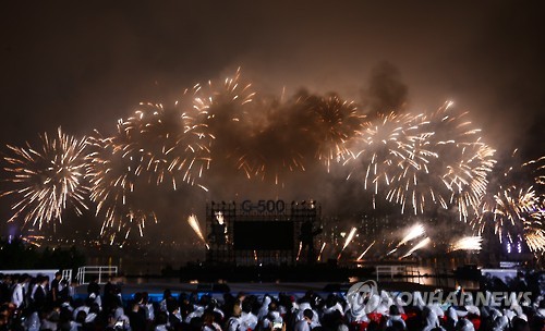 Fireworks go off at Yeouido Park by the Han River in Seoul during the ceremony commemorating the 500-day countdown to the 2018 PyeongChang Winter Olympics on Sept. 27, 2016. 
