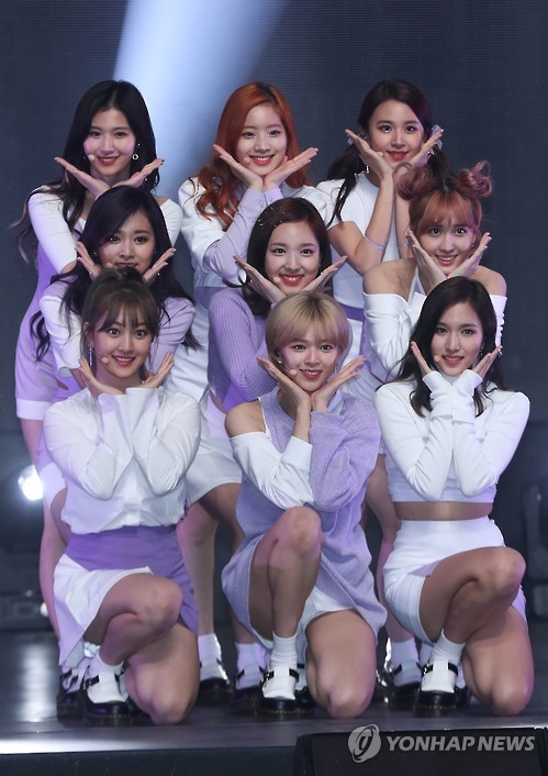 Members of South Korean girl group TWICE pose in a media showcase for its third and latest EP "TWICEcoaster : LANE 1" in central Seoul on Oct. 24, 2016.