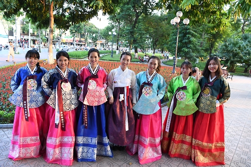 This undated photo provided by the Korean Cultural Center in Vietnam shows Kwon Miru (fourth from the left) in Korean traditional dress hanbok.