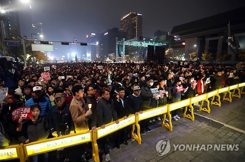 Protesters join a rally in Seoul on Nov. 5, 2016, demanding President Park Geun-hye step down from office. 