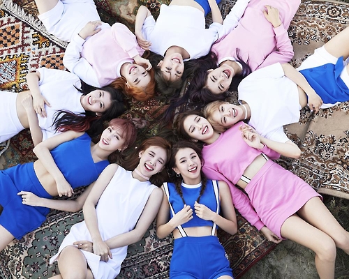 The file photo, provided by JYP Entertainment, shows members of the South Korean girl group TWICE. 